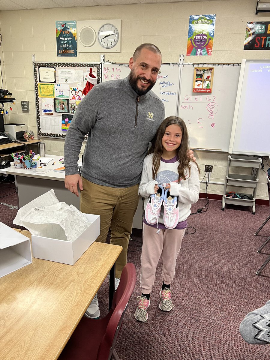 'Special delivery! 📦 This morning, Mr. Hauser brought Isabella R. her custom-made Nikes right to her classroom. Talk about personalized style! 👟 #CustomKicks #MorningSurprise'