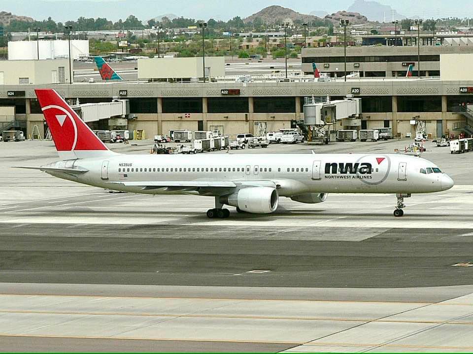 n194at's tweet photo. Northwest Airlines 
Boeing 757-251 N535US
PHX/KPHX Phoenix Sky Harbor International Airport
May 2, 2006 
Photo credit Peter Barford 
#AvGeek #Airline #Aviation #AvGeeks #Boeing #B757 #NorthwestAirlines #NWA @nwa_airlines @NW_Airlines #PHX @PHXSkyHarbor https://t.co/mJLBFRoxEi