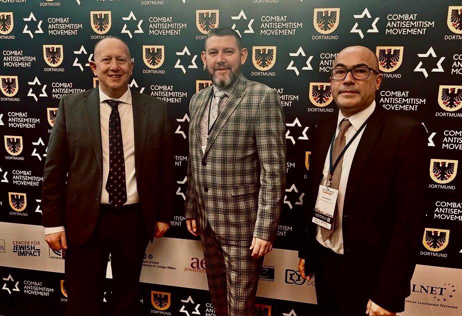 HertsLabourUK's tweet photo. Mayor of Hertsmere, Chris Myers, Leader of Hertsmere @Jeremy_Newmark &amp; Deputy Paul Richards are representing the Borough at the 2023 European Mayors Summit Against Antisemitism in Dortmund, Germany, with all the guest speakers being leaders in local government from across Europe https://t.co/YHJDSz2eSF
