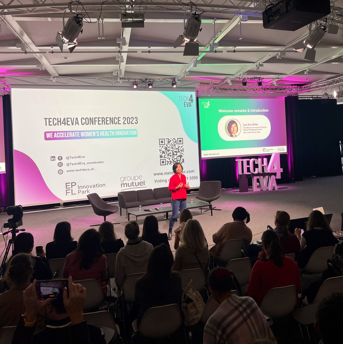 startuptickerCH's tweet image. Lan Zuo Gillet, Deputy Managing Director, EPFL Innovation Park &amp;amp; Program Director opening the #Tech4Eva Conference 2023 in packed room at the Rolex Learning Center #femtech