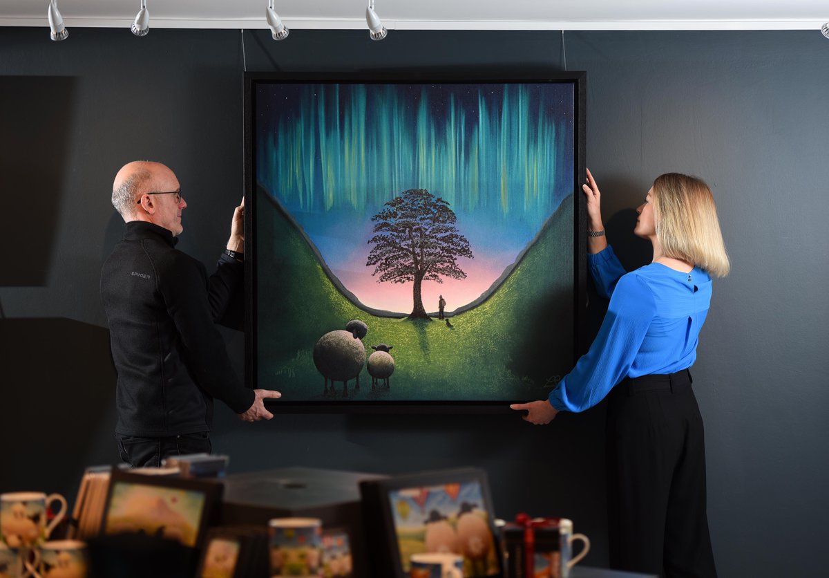 The Daily Telegraph used this picture of artist Lucy Pittaway and colleague Chris Bradley by our photographer Asadour Guzelian. Lucy was distressed at the felling of the Sycamore Gap tree. Print sales from Lucy's picture will be used to create a 1,000 tree woodland.