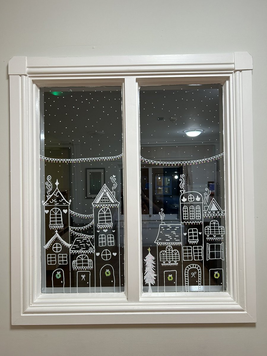 Our AC Alice has been getting festive decorating the ward windows today ❄️☃️