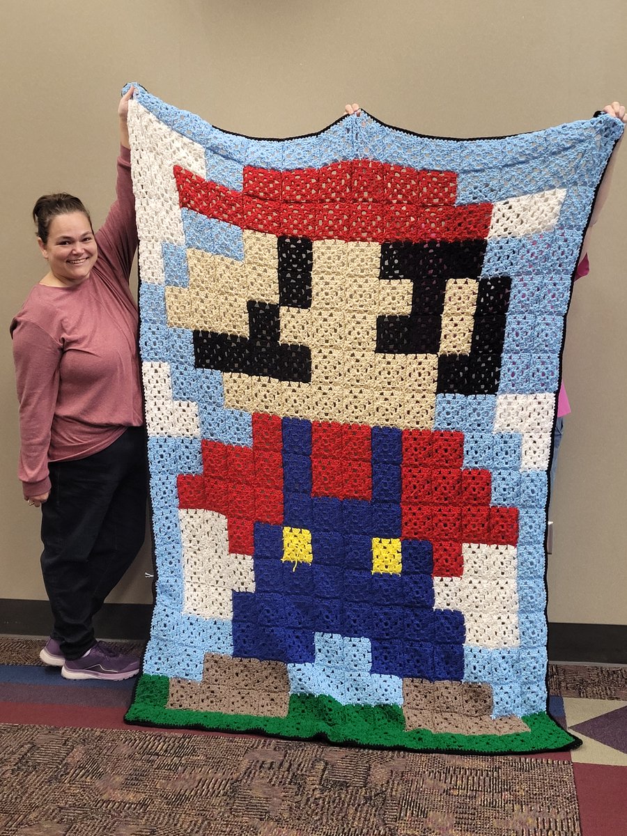 How amazing is this Mario quilt that was crafted by a member of the North Shreveport Branch's crochet group? We think that Mario's looking super! #ShreveMemorialLibrary