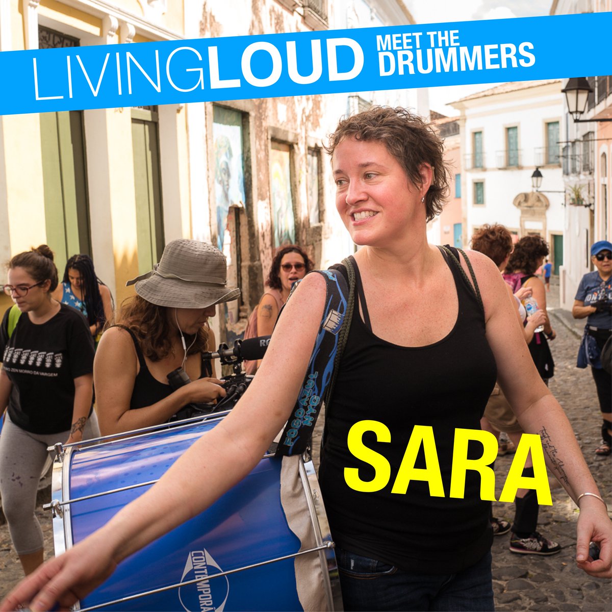 Sara was born deaf and wears cochlear implants in both of her ears. She plays the ‘surdo’ drum which means ‘deaf’ in Portuguese. It is one of the largest drums with a deep sonic beat that Sara can literally feel. Otherwise she watches the other drummers and follows their lead.