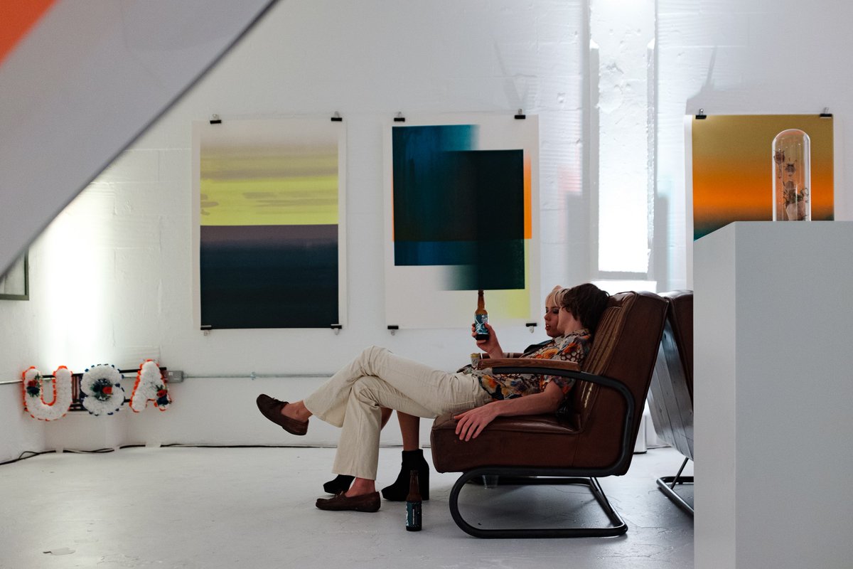 FurnitureMove's tweet photo. A Little Throwback: @jacketreqd of people enjoying a rest on our Aviator Sofa, it looks great in the bright, white space!

Check out the Aviator Sofa on our website here: https://t.co/8X7O42kZkj https://t.co/6WuUpqSGxS