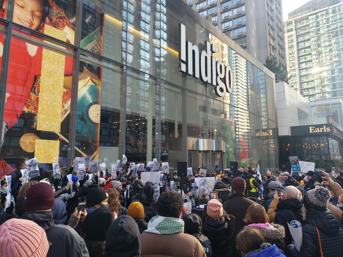 dgrdon's tweet photo. The coalition Jews Say No to Genocide held a press conference this morning. Behind the speakers people held signs saying "Jews say: postering Indigo is not antisemitism" and the same poster put up earlier this month, "Heather's Pick: Funding Genocide." https://t.co/IoDgVL9h8T