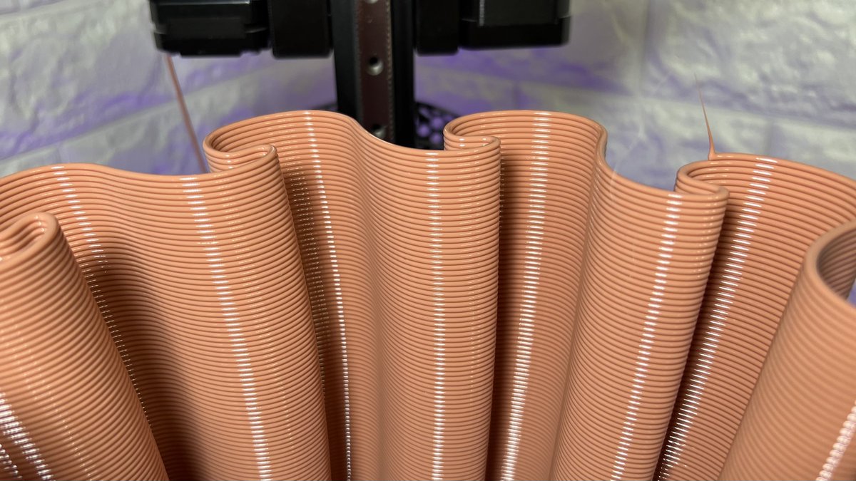 FilamentFrenzy's tweet photo. How awesome is that ? 😍

Wavy 1.0 from @printablescom 

@Prusa3D @Trilab3D DeltiQ 2 Plus with a flex drive system 

Sliced at 1.4mm layers with a 1.8mm nozzle using @PrusaSlicer 

@prusament terracotta PETG is stunning, might build a printer out of it 🖤🧡

#EmbraceTheLayers https://t.co/Lr5YnScRz9