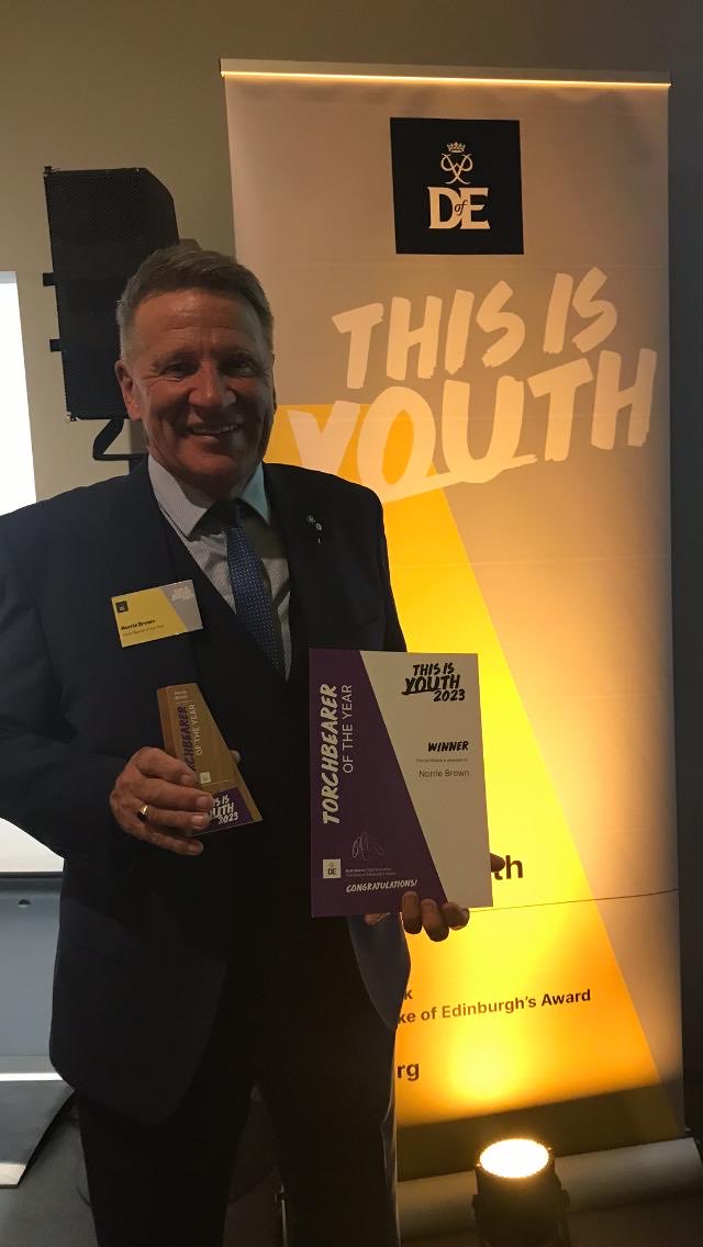 Auchenharvie's tweet photo. Well done to our very own Norrie Brown who was presented the National Torchbearer award in London this week. This is in recognition of his outstanding work on the Duke of Edinburgh programme over many years at Auchenharvie. Well deserved Norrie, a real hero in our community. 👍 https://t.co/psTJJTNGF8