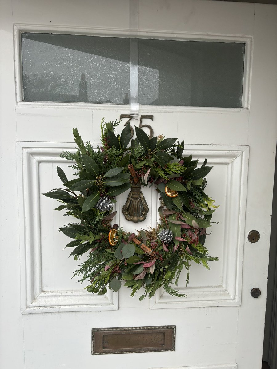 GemmaOsgood's tweet photo. Proud of my creation yesterday from the @HughJamesLegal London wreath making - now hanging proudly on the front door 😊 https://t.co/MueATQrWpN
