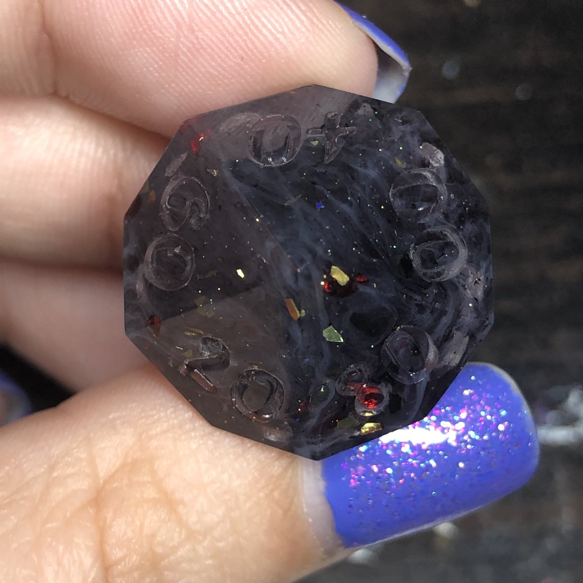 HealersHug's tweet image. Smoke and Embers dice set. The camera has a hard time picking up the subtle grey swirls in some of the darker dice which is a little frustrating. 
#dice #dnd #dicemaker #ttrpg