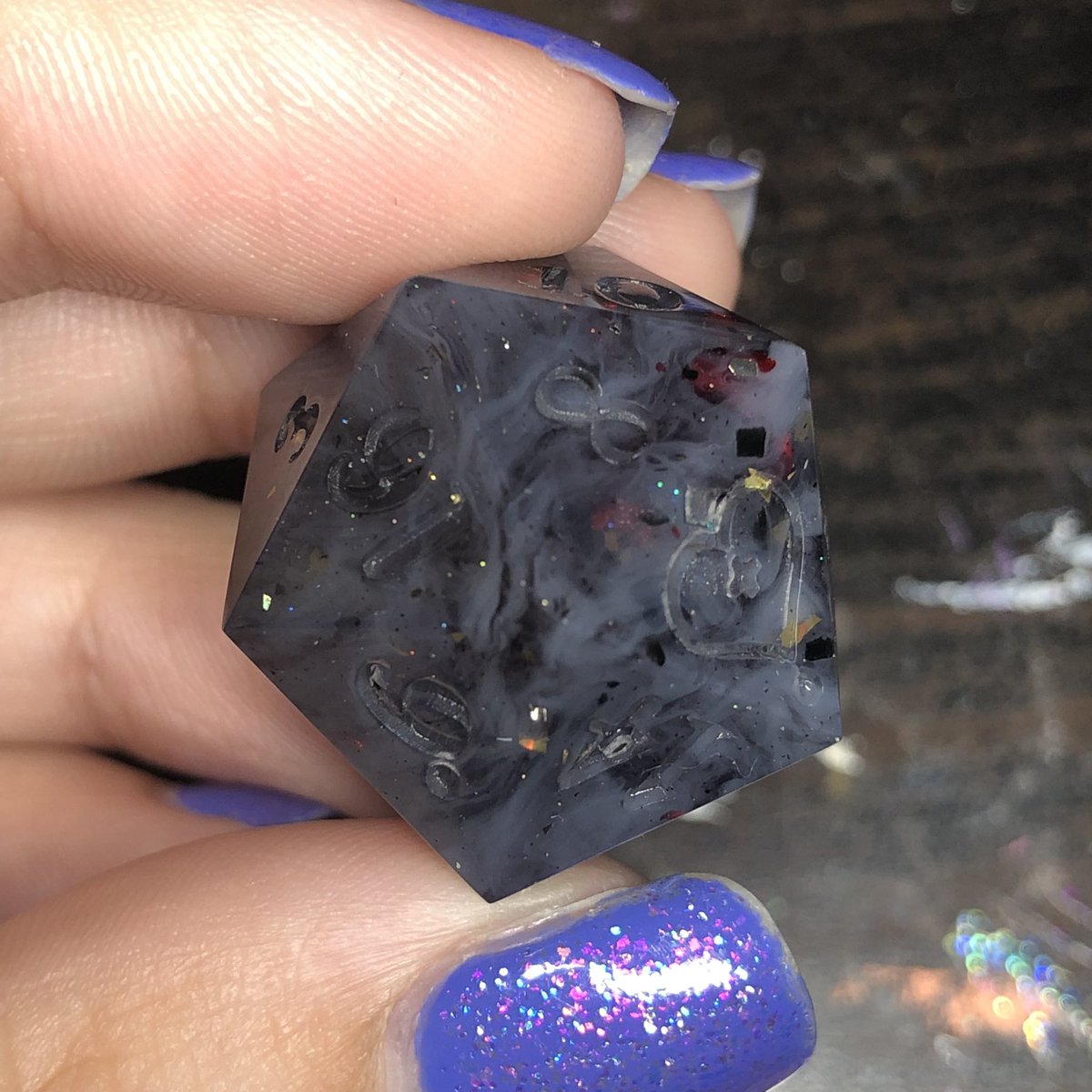 HealersHug's tweet image. Smoke and Embers dice set. The camera has a hard time picking up the subtle grey swirls in some of the darker dice which is a little frustrating. 
#dice #dnd #dicemaker #ttrpg