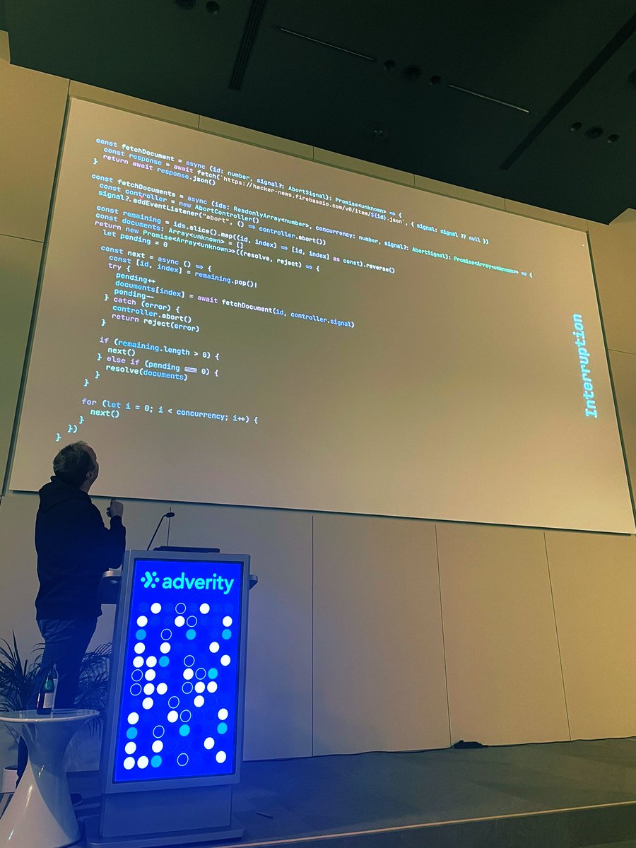 @thefubhy on stage asking us to find a bug in this code. Easy peasy. Amazing talk about #effect #ts! @ReactVienna