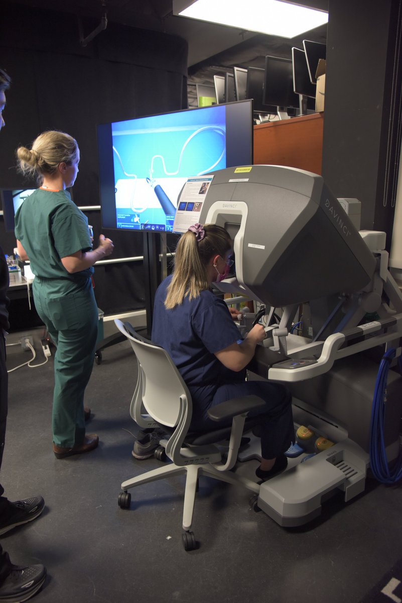 EVMSedu's tweet image. EVMS' Surgery Club recently organized a hands-on session featuring the da Vinci surgical robot and laparoscopy simulators. 

Students put their skills to the test under the guidance and expertise of Dr. Hannah Palin, who was present to provide valuable insights and support.