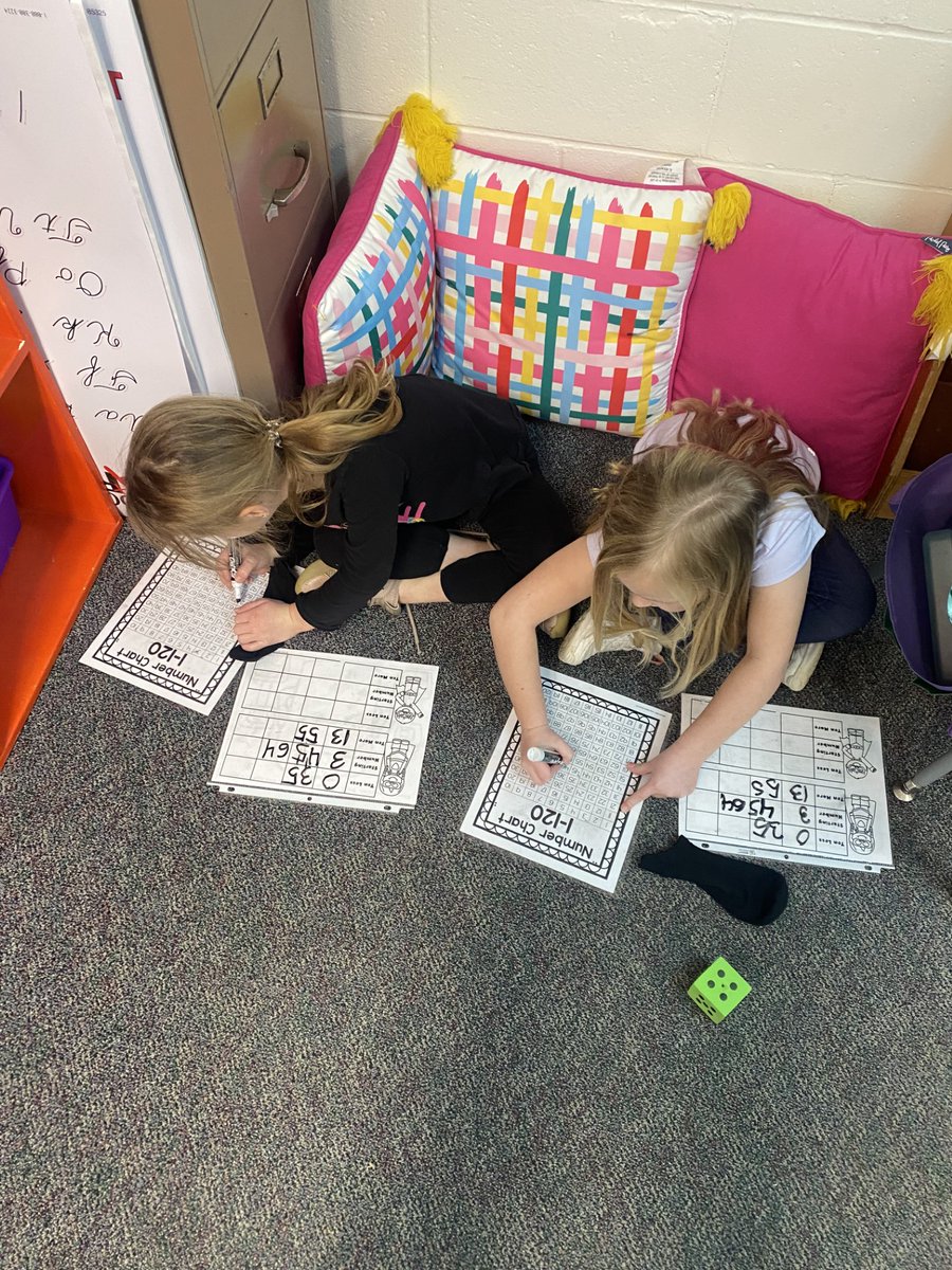 Ms. Klee's class working in partners to find 10 more and 10 less than the two-digit number they rolled. #wtetowerup