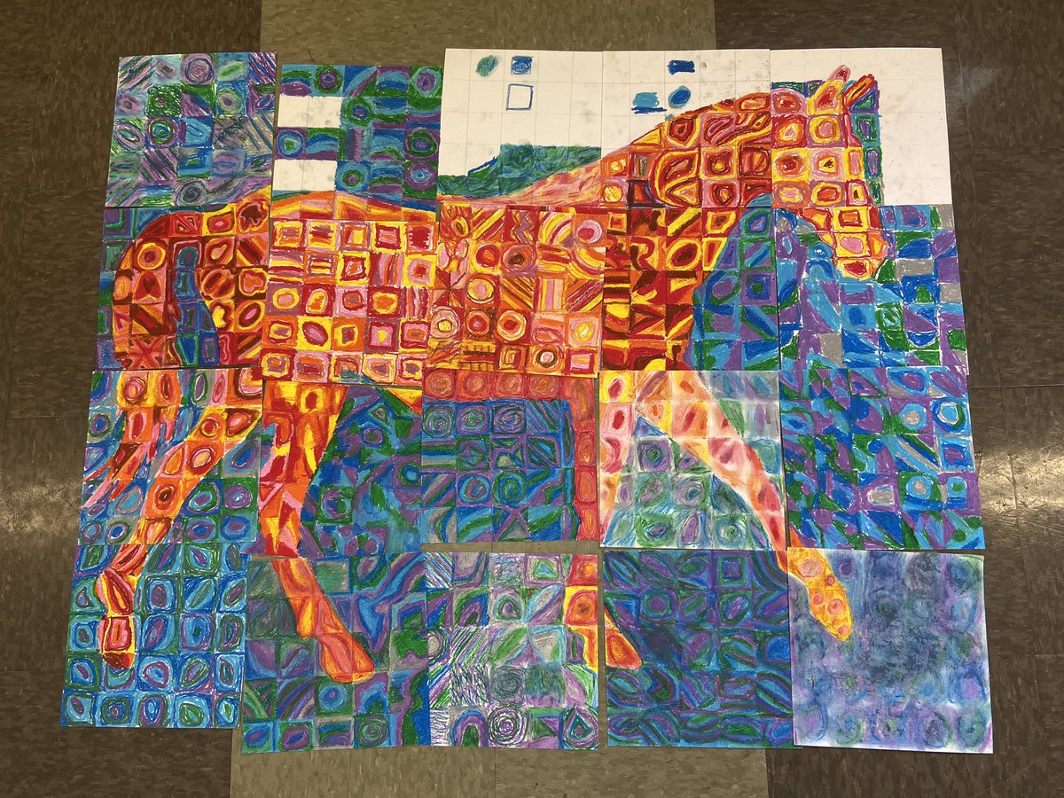 Grad 8 students are working very hard on the mysterious oil pastel puzzle. Almost there!