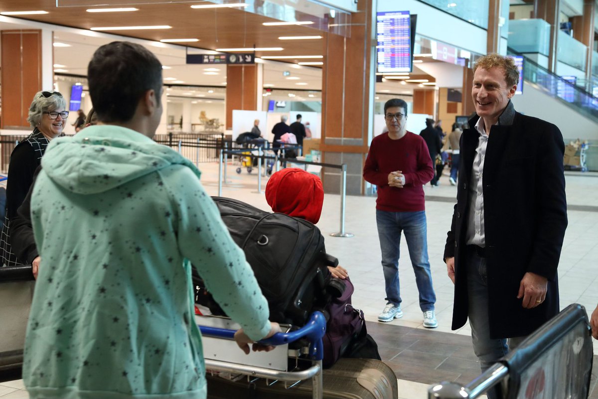 MarcMillerVM's tweet photo. Today, I welcomed 354 Afghan nationals to Halifax on a charter flight from Pakistan. They will continue their journey to 26 communities across Canada, including Calgary, Fredericton and Ottawa. Welcome home! https://t.co/oHGgTaY2Tl