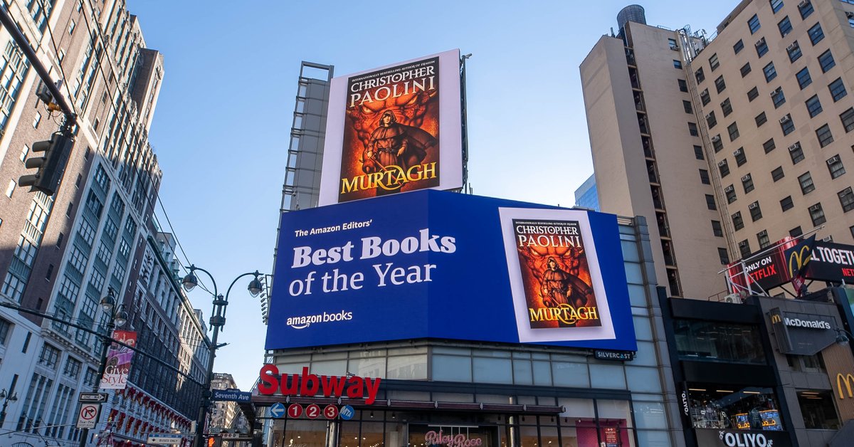 paolini's tweet photo. I’m excited to share that Murtagh is one of the @amazonbooks editors’ Top Teen &amp; YA Books of 2023 – and it’s on a billboard in NYC! See the full list here: https://t.co/56yoX5Xh7r

@GetUnderlined #Murtagh #WorldofEragon https://t.co/OxxlkLe0yj
