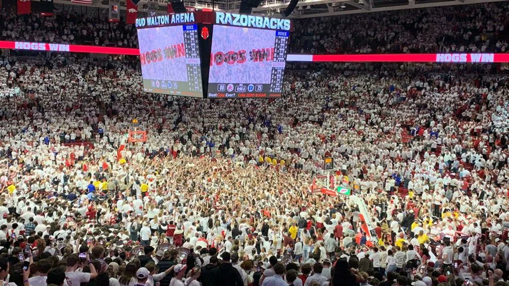 KATVNews's tweet photo. The @UArkansas was fined thousands of dollars by the @SEC Thursday after a rowdy crowd of #Arkansas @RazorbackMBB fans stormed the court after the basketball team's win against @DukeMBB the night before. https://t.co/w9Ds87jqoc | #arnews #hogcentral https://t.co/bxEvQPXg1q