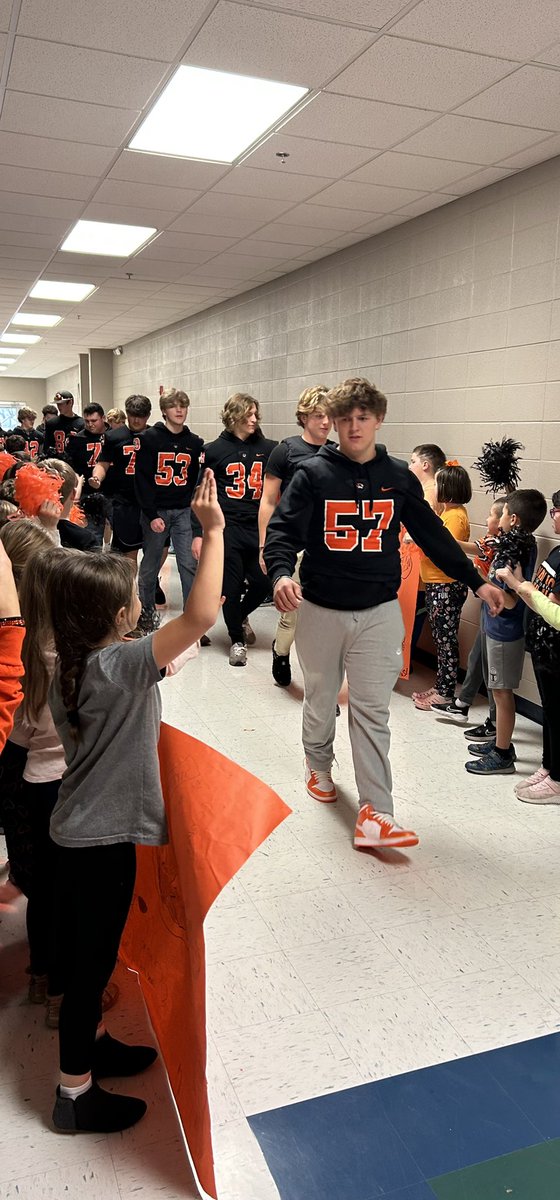 KimPragman's tweet photo. The rain didn’t stop us from cheering on the Tigers to STATE🏈🧡 
#RepMoProud https://t.co/1o5pQpuuu6
