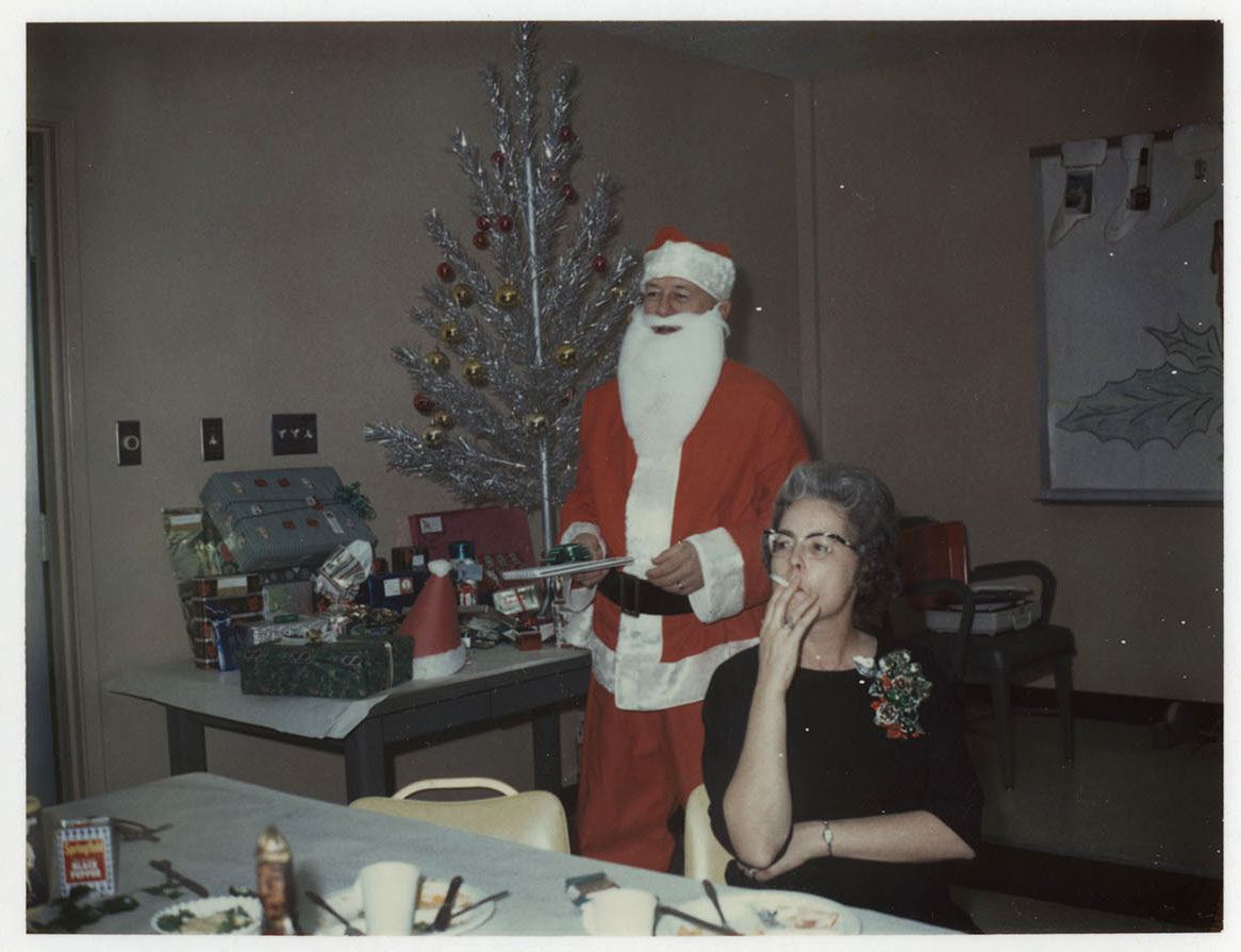 Here we have a National Archives employee from 1965 out of our old office in Bell, California enjoying a gift she received from Santa. #ArchivesGiftExchange #ArchivesHashtagParty