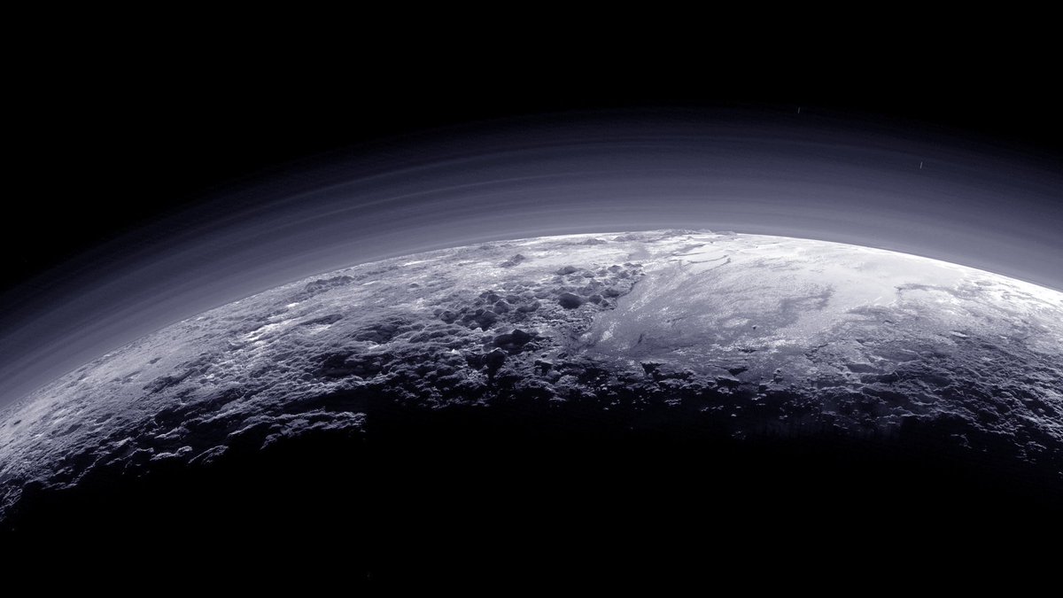 This is Pluto. Where there are water-ice mountains four kilometres tall.
