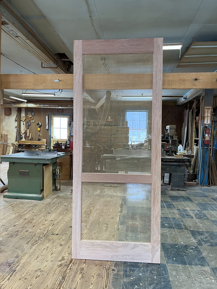 Custom mahogany wood screen door with bronze screen, Jim Illingworth Millwork