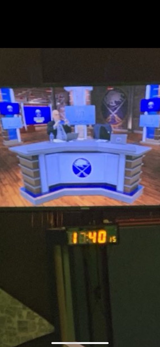 Jesse_Dewey's tweet photo. @hsimon62 @duffersabres @martybiron43 The zoom in of Howard taking a picture of the set looks like a Sims version of Howard taking a picture @JeremyWGR https://t.co/q6mgg1mTIs