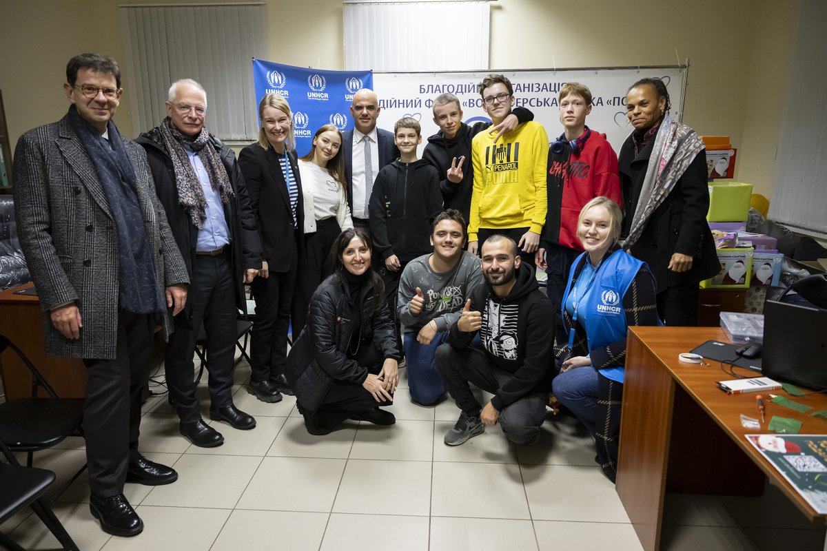 SwissUA's tweet photo. At the end of his visit to 🇺🇦, President of 🇨🇭 Alain Berset visited a 🇨🇭-supported space for displaced people, run by @UNHCRUkraine &amp; @PoruchSpilka.
He heard stories of displacement and resilience from adults and children who attend IT classes here to cope with the trauma of war. https://t.co/RAp0RKliM0