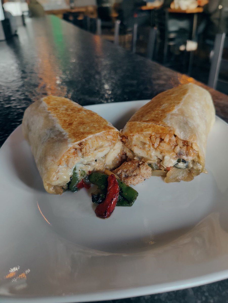 December BOM (Burrito of Month) is the Fajita-rito. Rice, Seasoned Chicken Breast, Sauteed Onions and Bell Peppers, Monterey Jack Cheese and Avocado Ranch.