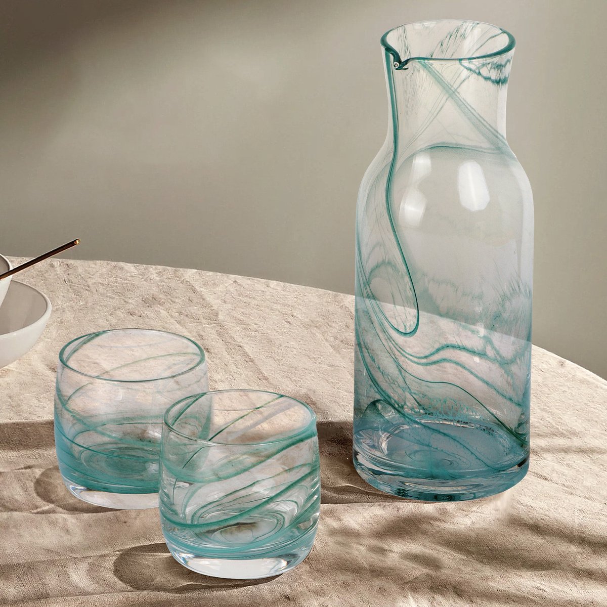 EkaGlassware's tweet image. Add a charming touch to your table setting with our Swirl Drinking Glass Set. Graceful twirls of color flow embedded in this glassware, evoking the rhythm of water ripples. This glassware will bring the perfect atmosphere to any home, kitchen, bar or restaurant.🥃🧋#EKAGROUP