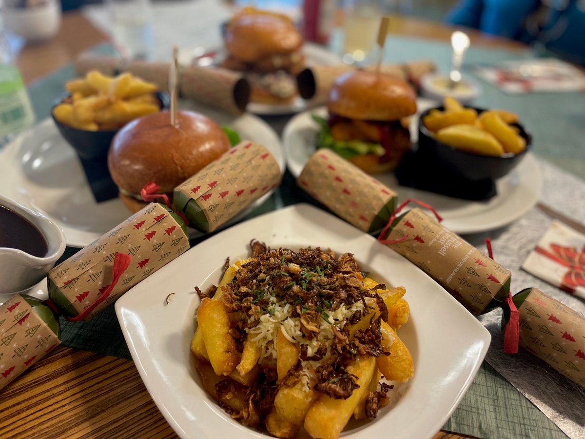 Our Christmas menu dishes are flying out of the kitchen this lunchtime. Book your table today and prepare to tuck into a deep fried brie burger, turkey burger and the fully festive loaded chips with onion gravy, crispy sprouts and cheese! nationalstar.org/visit-us/starb…