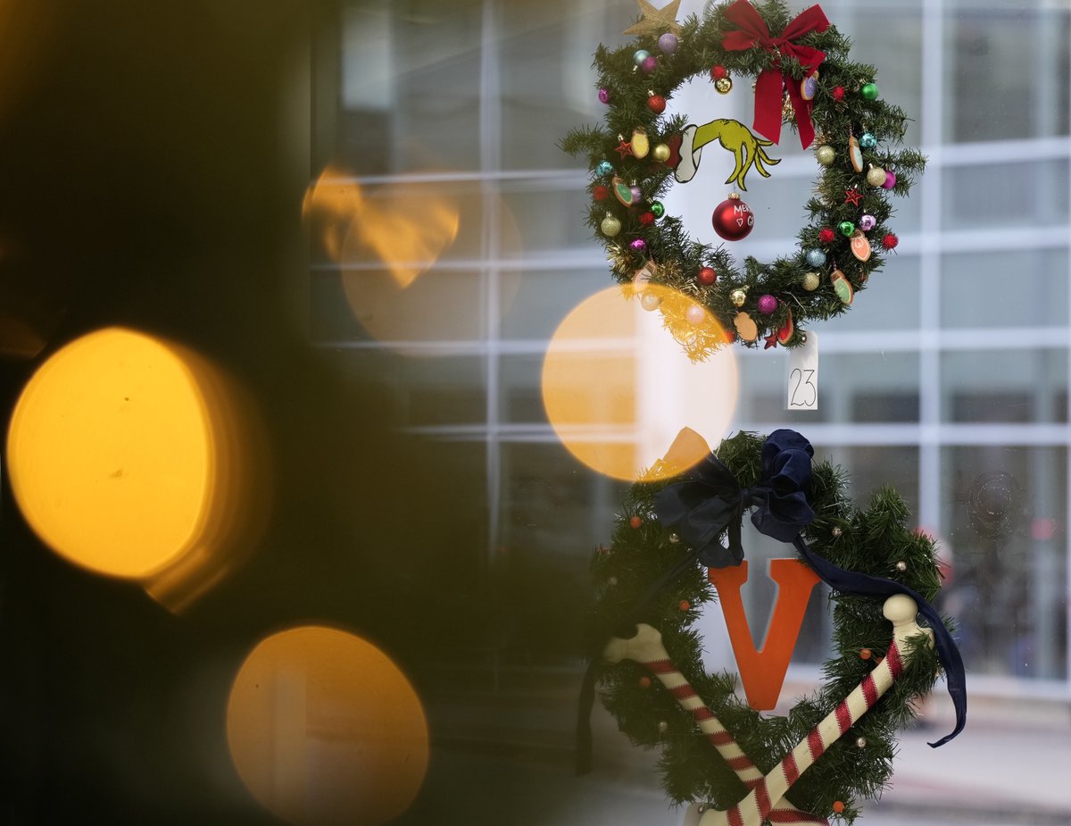 The UVA Christmas spirit is captured in a wreath up for auction and currently hanging in a <a href="/uvahealthnews/">UVA Health</a> Emily Couric Clinical Cancer Center hall with 112 others. The auction will raise money to help patients who face financial challenges. bit.ly/47C9yIe