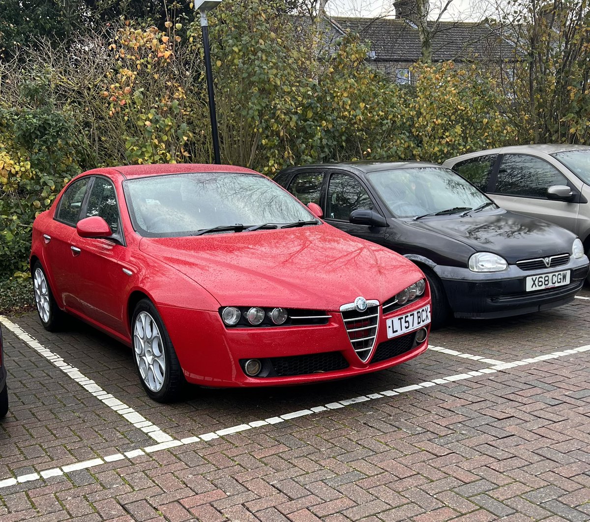 A rather splendid Alfa 159 spot today at the Doctors this was  superb and the corsa next to it wasn’t far off #weirdcartwitter