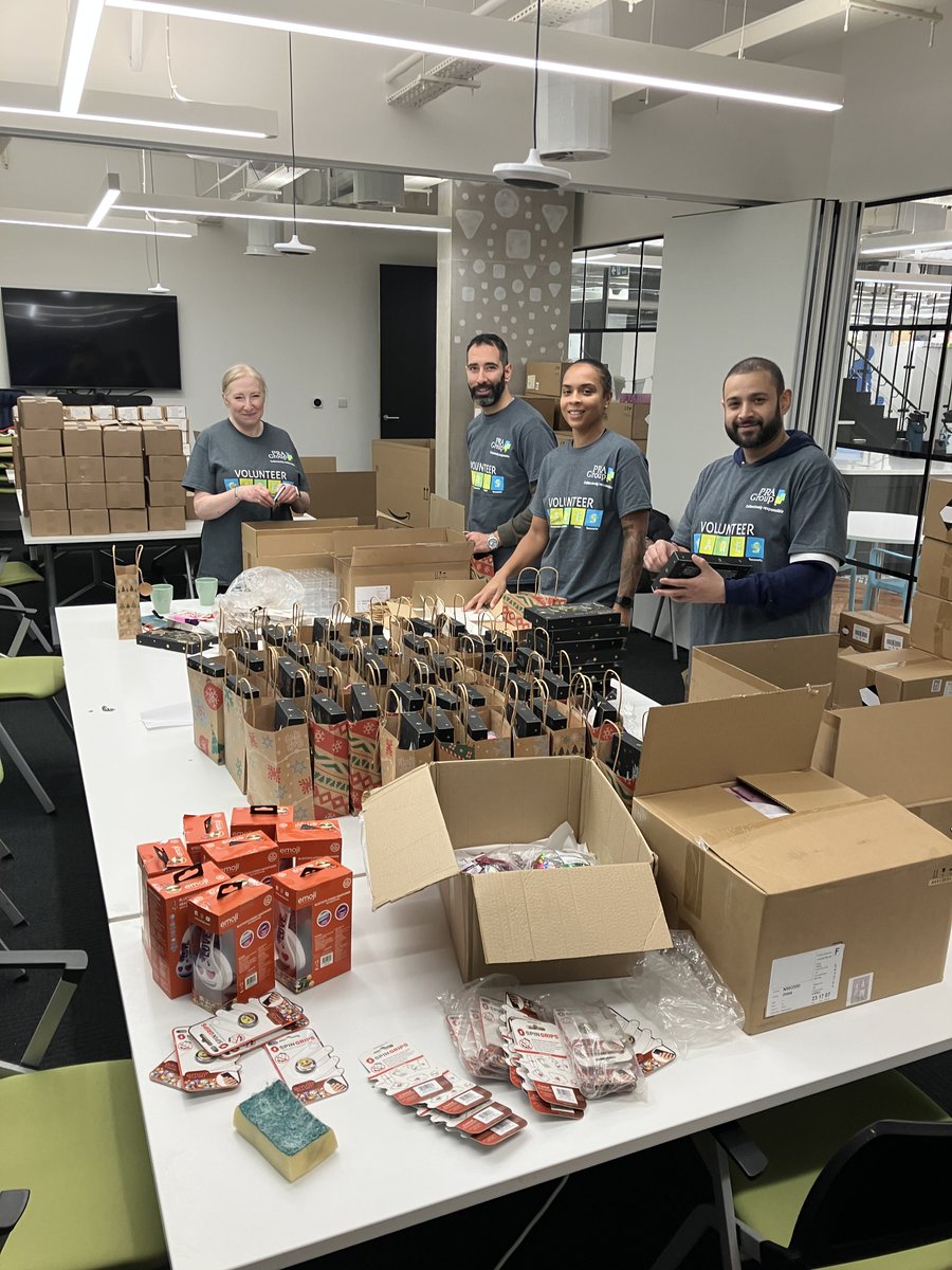 PRAGroupInc's tweet photo. Our team in London, England, volunteered to support @family_action's annual Toy Appeal, helping with preparation, unloading gift vans, organising parcels, and assembling gift bags. #GlobalReach #LocalTouch #PRAImpact https://t.co/etYzCRSGNs