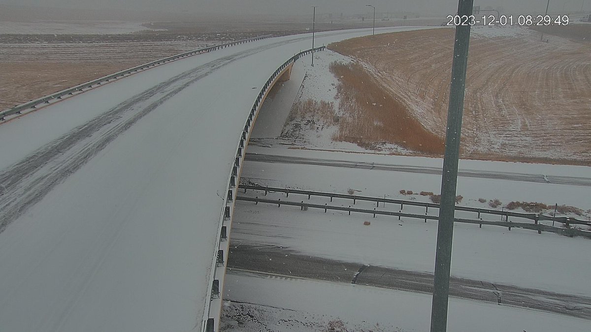 NWSPueblo's tweet photo. Webcams showing a small band of snow out near Lamar. About half an inch of accumulation will be possible, along with slick roads and reduced visibility. Practice careful driving habits! #cowx (image credit: CDOT) https://t.co/1QBQ5WXa3q