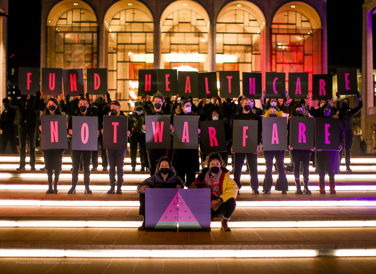 HIV/AIDS activists, healthcare advocates, and Palestine solidarity activists gathered on the eve of the 35th annual World AIDS Day on the steps of Lincoln Center to tell the US government: FUND HEALTHCARE, NOT WARFARE!