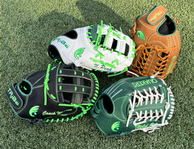 TribeGloveCo's tweet photo. The first batch of Quaker gloves are in and look ELECTRIC ⚡️. Thanks to @DubC_CoachMeg and @DubC_Softball for this latest wave of 🔥 designs. @kenzieoneil_23, @held_rylee #WeAreDubC https://t.co/gj8tADGnFt