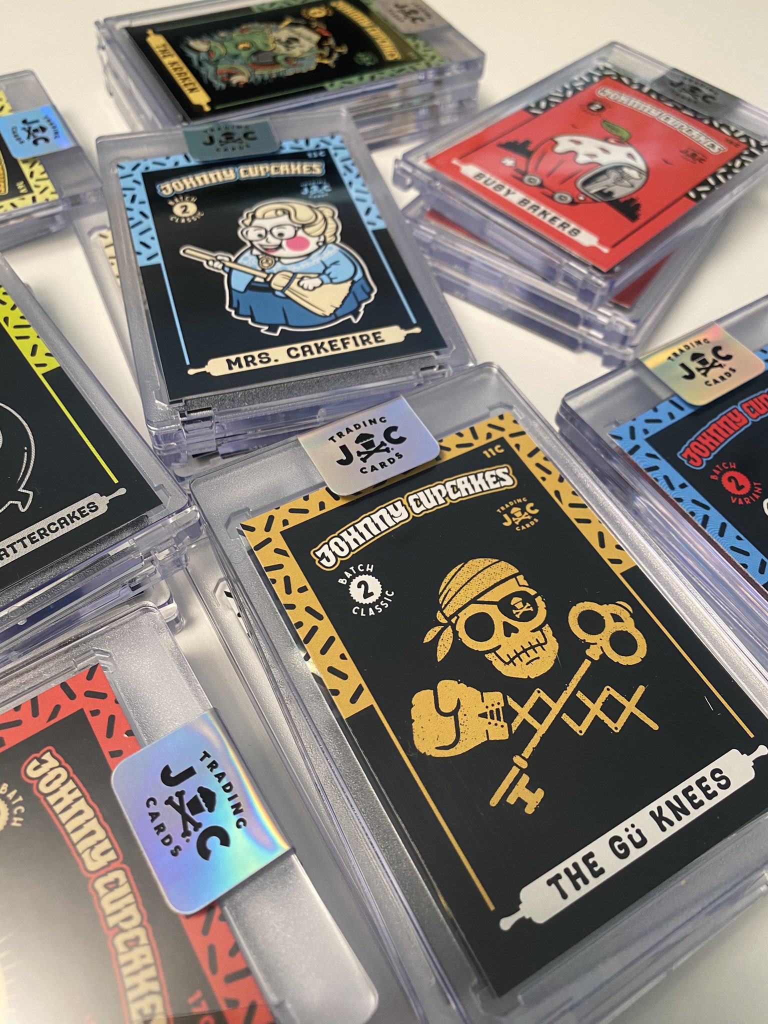 Johnny Cupcakes on X Batch 2 Series 2 trading cards are looking juicy and available now here https t P4j6UWMUGO tradingcards hologram thehobby johnnycupcakes packagedesign boston pokemonCards comic...