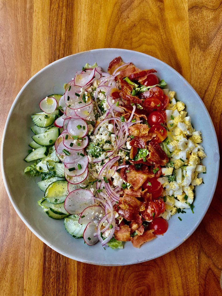 Cobb Salad 
Romaine 
Ranch Dressing 
Cucumber 
Radish 
Blue Cheese Crumble 
Red Onion
Bacon 
Tomato 
Hard Boiled Eggs 

Option to add on chicken or salmon. Now on the brunch menu at @bowoodbyniche 🌱