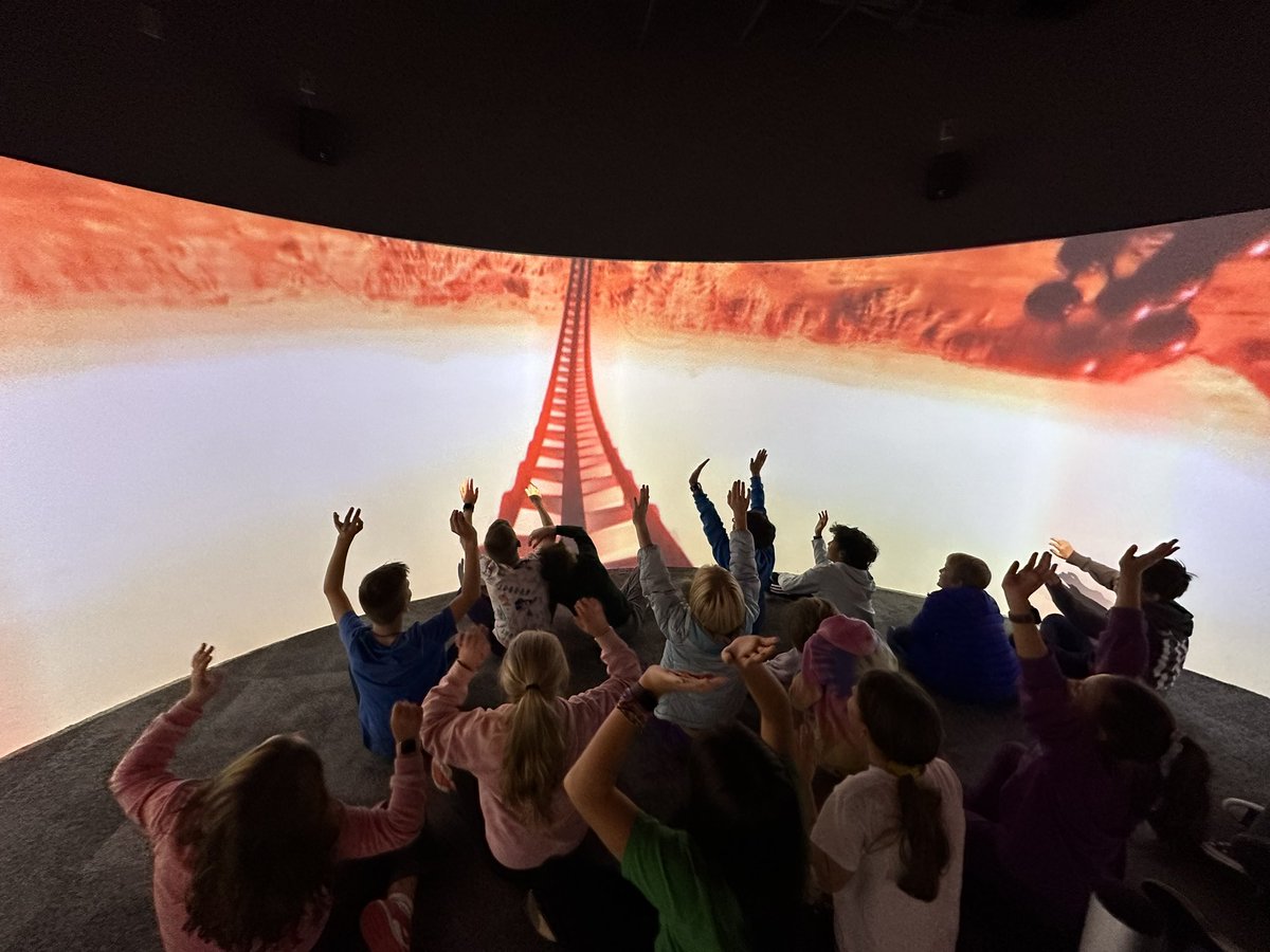 AdamFineske's tweet photo. An amazing view from our one of a kind @ohschools 360 degree immersion classroom located in our Foundry learning space! These 5th graders got to take a roller coaster ride to Mars…and learned so much about space in such a unique a special way! #GoGreenBears https://t.co/790vJdpv7v