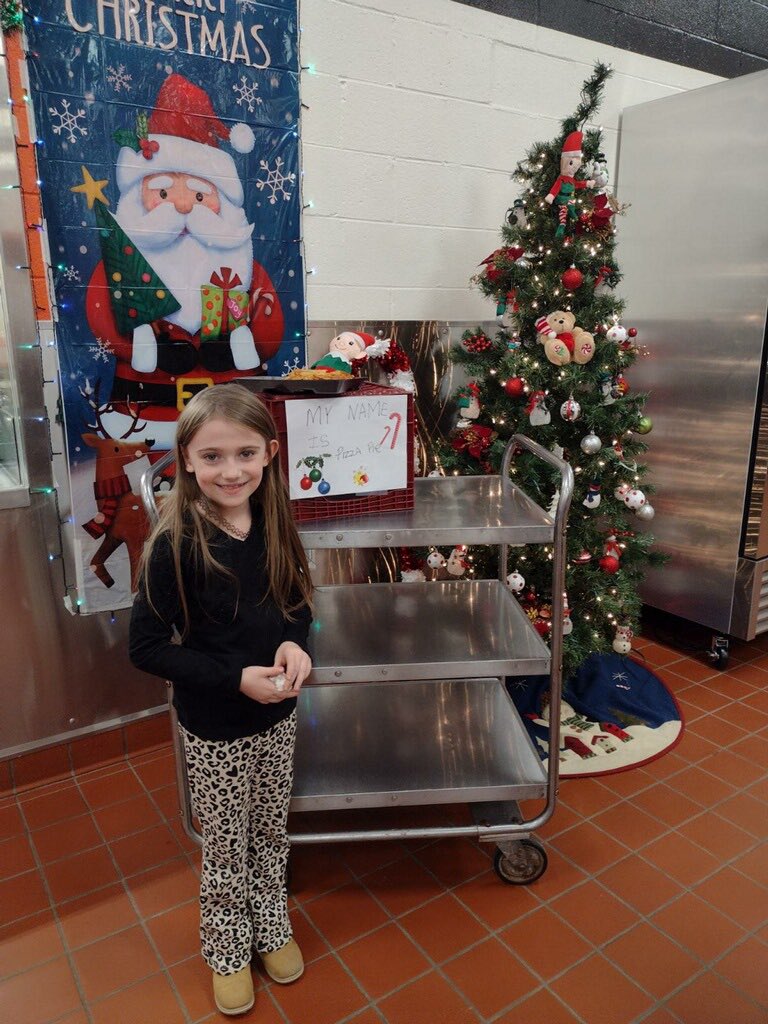 WreckerCafe's tweet photo. The Elementary students were surprised today by the visit of Santa’s Elf, Pizza Pie. He will be visiting until the holiday break. We can’t wait to see all the fun he creates inside the cafeteria. #WeareTNG https://t.co/DyjWyp29Fd