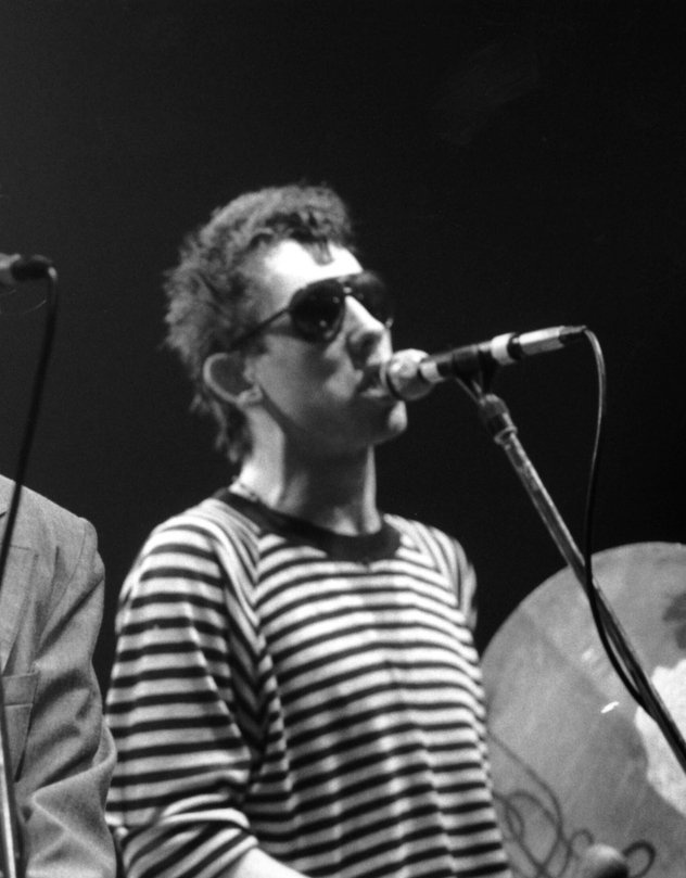 IrishLitTimes's tweet photo. "Shane has the gift. I believe him. He knows how to tell a story. The Pogues are a roaring, stumbling band. These are the Dead End kids for real. Shane's voice conveys so much… It's whimsical and blasphemous, seasick and sacrilegious." Tom Waits, 1999. https://t.co/O87Z1jii9Z
