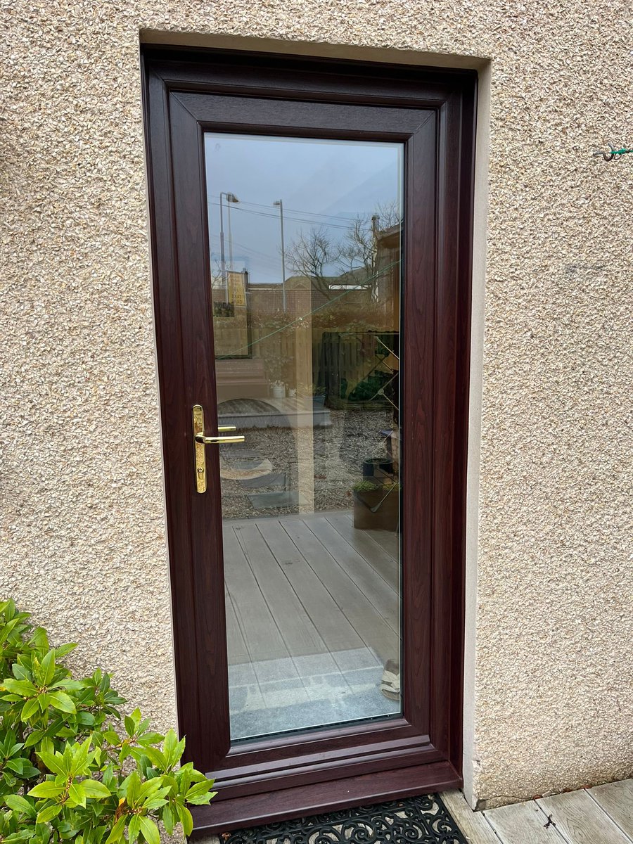 Replacement of a wooden front door changed to a rosewood composite door and a replacement wooden back door changed to a rosewood UPVC door.