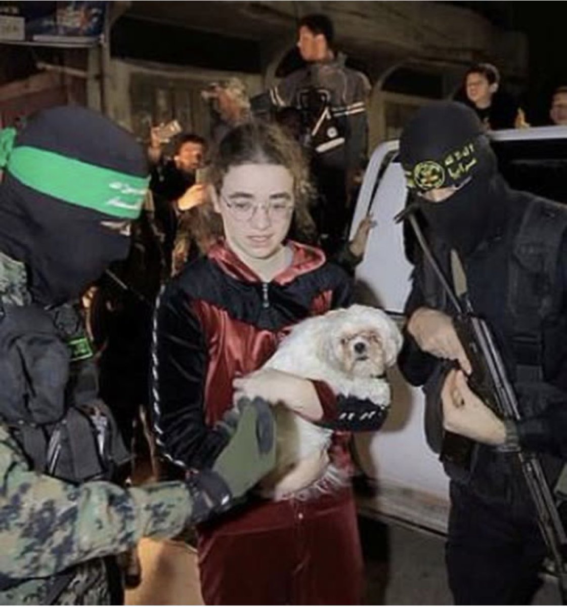 nothing can separate a girl and her crusty eye white dog not even Hamas