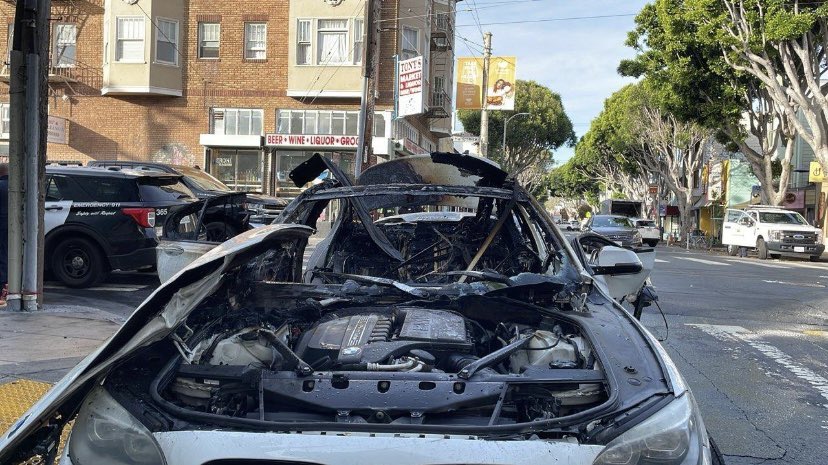 henrykleeKTVU's tweet photo. This BMW 5 Series was found on fire near 24th & Hampshire in the Mission and was doused by #SFFire. No one hurt. @SFPD @SFPDMission investigating circumstances https://t.co/1cqAy5RJZS