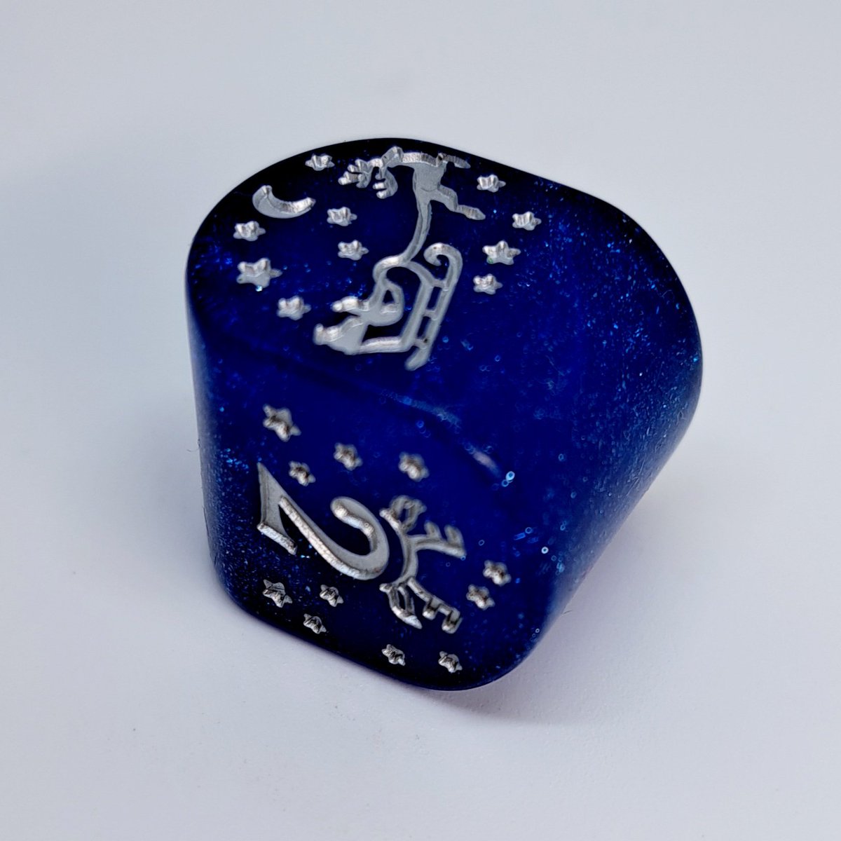 tildicepodcast's tweet photo. Aww yeah! 🎲 It's the most wonderful time of year because we've got our hands on another @Unusualdice #dice #AdventCalendar! Day 1 is off to an amazing start with a blue sparkly modern D4 with Santa and his reindeer. Future days will be in the replies of this thread.
#qworkshop https://t.co/T6Nrvm7DzY