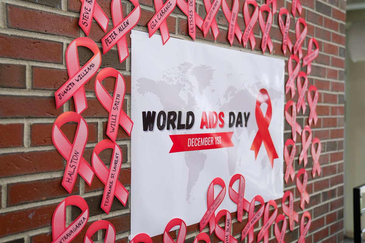 AIConcampus's tweet photo. On World AIDS Day, #AIC pays tribute to those we've lost to HIV. We appreciate @PPMASS and  @YWCAWesternMA for joining our campus remembrance today and supporting the ongoing fight to end the public health threat of HIV/AIDS. #rememberandcommit #fightaids #aicommitted https://t.co/xgEuTL1JsK