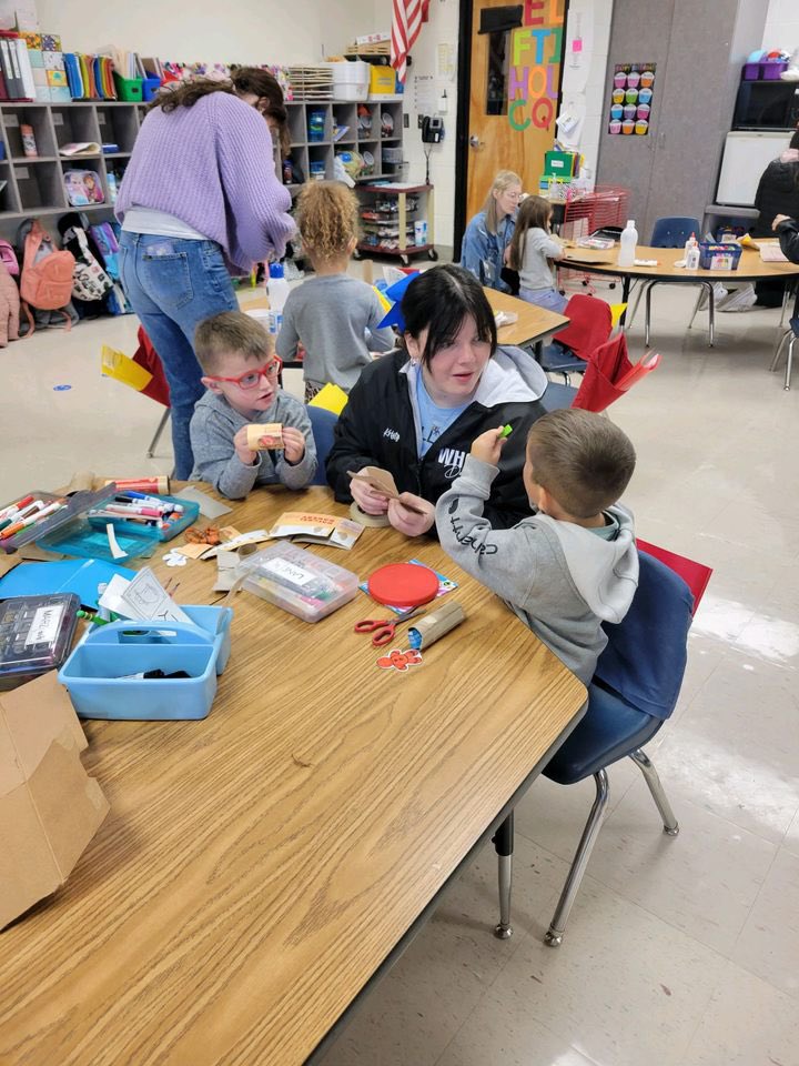 We had so much fun getting to go to Willard East this week! Each club member was paired with a pre-schooler and made the cutest gingerbread houses with them!
