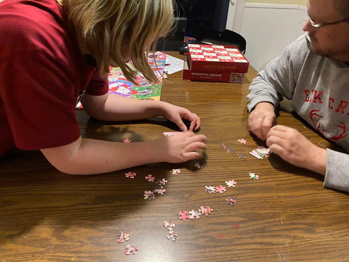Puzzle advent calendar started to help us have 15 minutes of family time each day during this busy season.