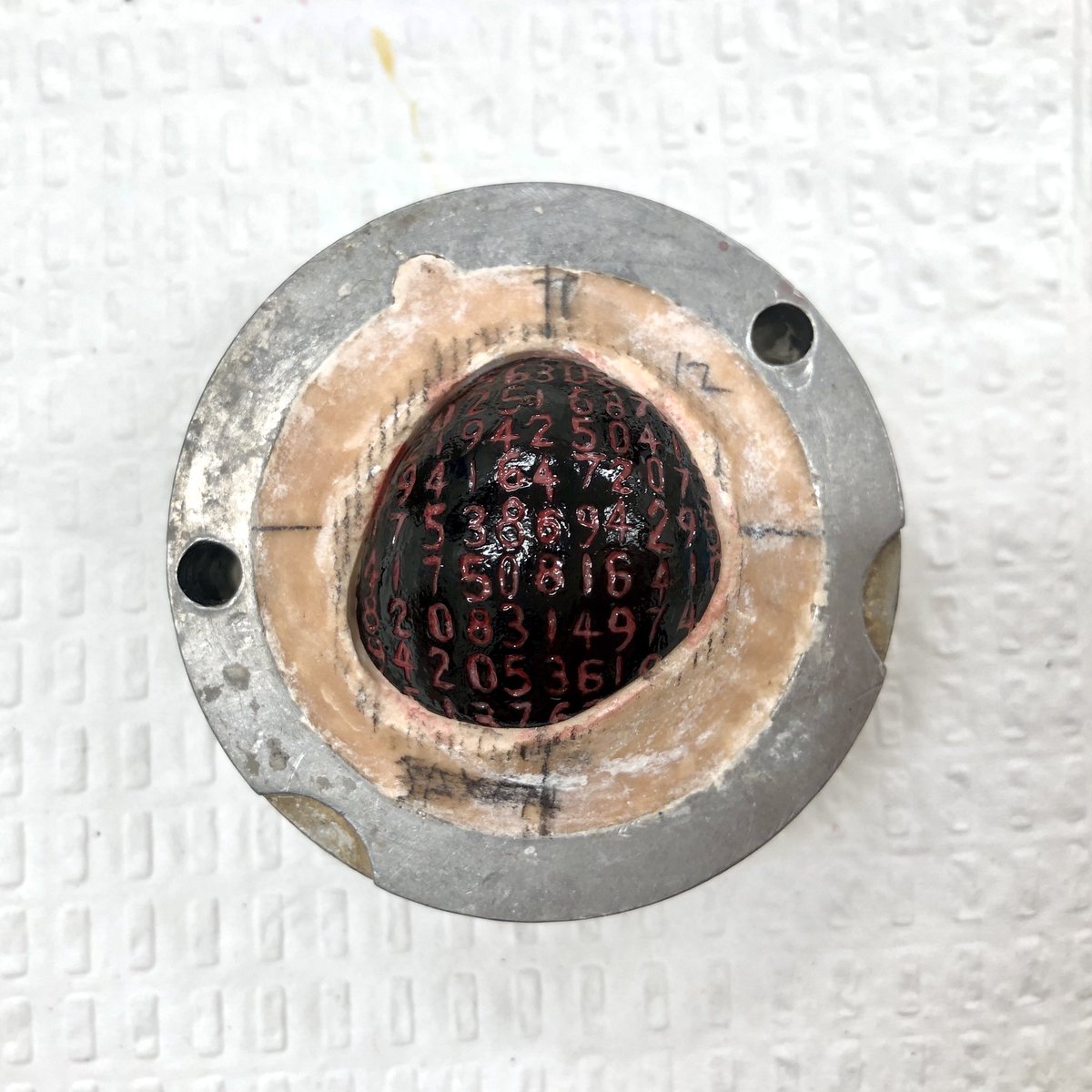prostheticslab's tweet photo. 1/2. This is one of the most challenging novelty eyes we’ve made:
1. paint everything black
2. grid the surface with pencil, 1mm apart
3. freehand the numbers with engraving tool and handpiece
4. touch up the numbers with paint
5. paint red over the entire surface https://t.co/o9c2Nxp5FB